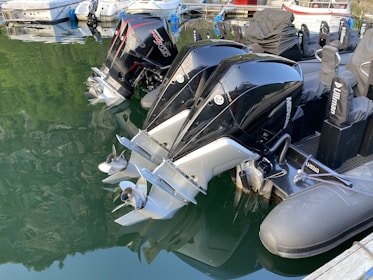 a couple of boats parked next to each other in the water