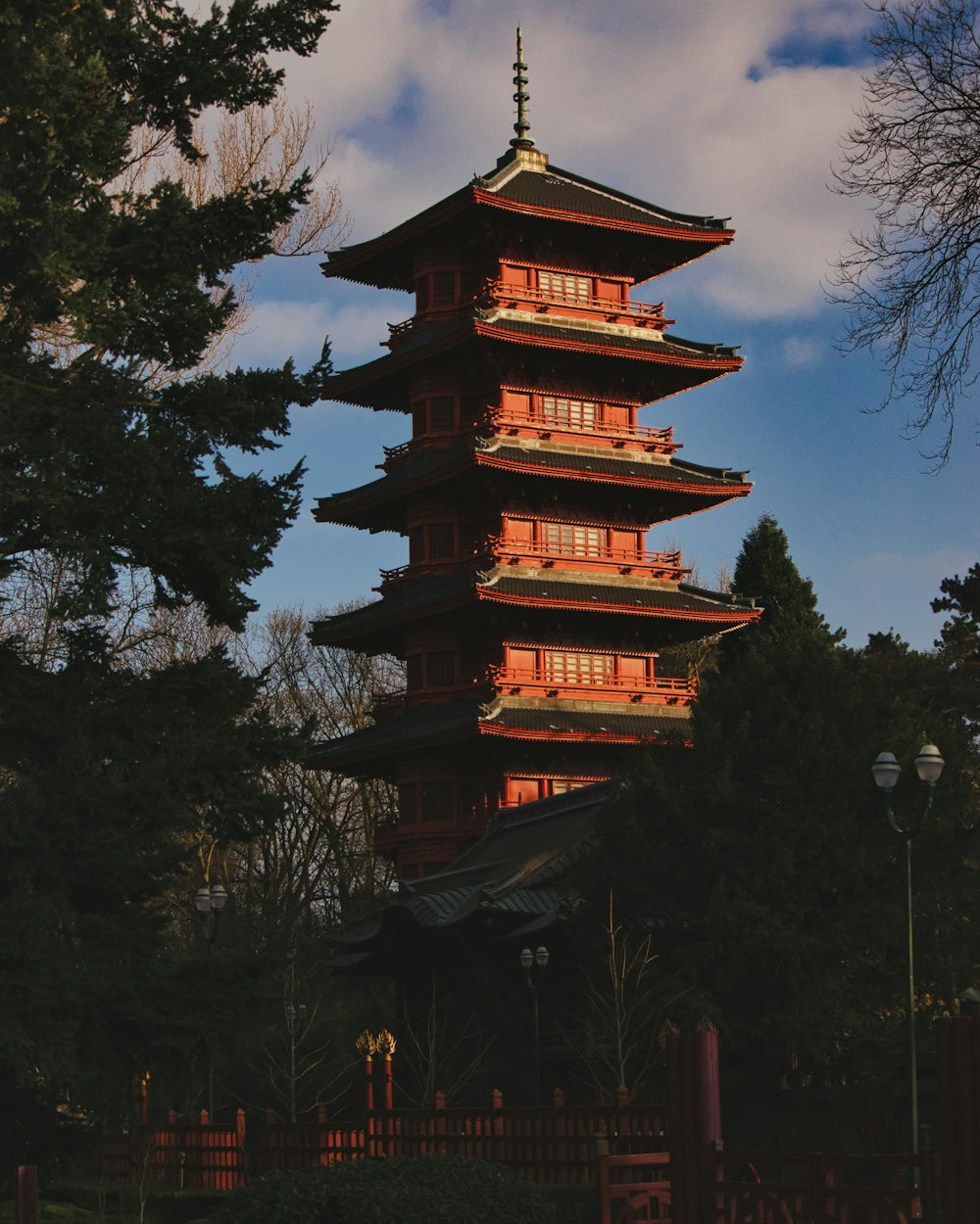 a tall building with a sky background