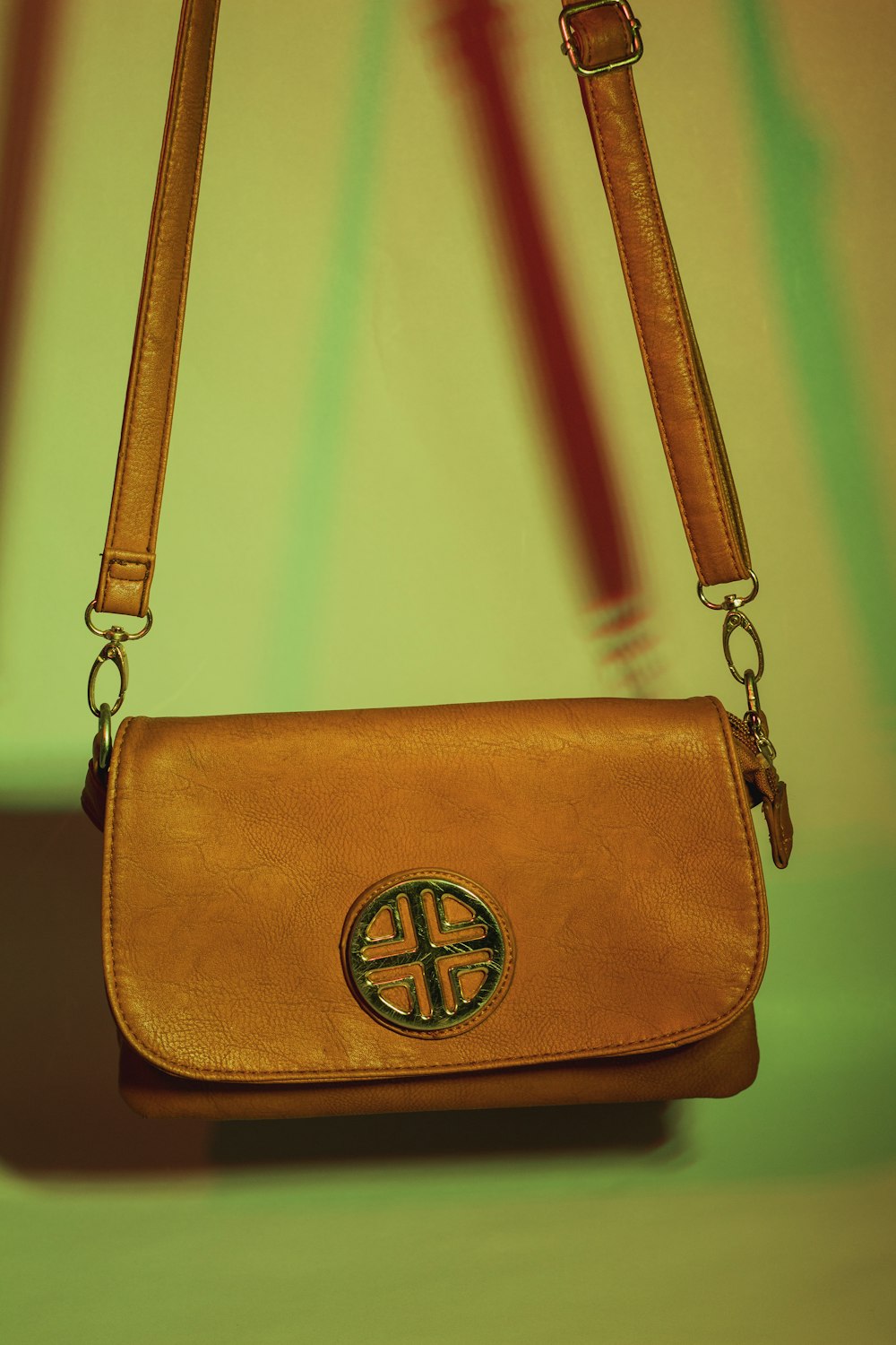 a brown purse sitting on top of a table