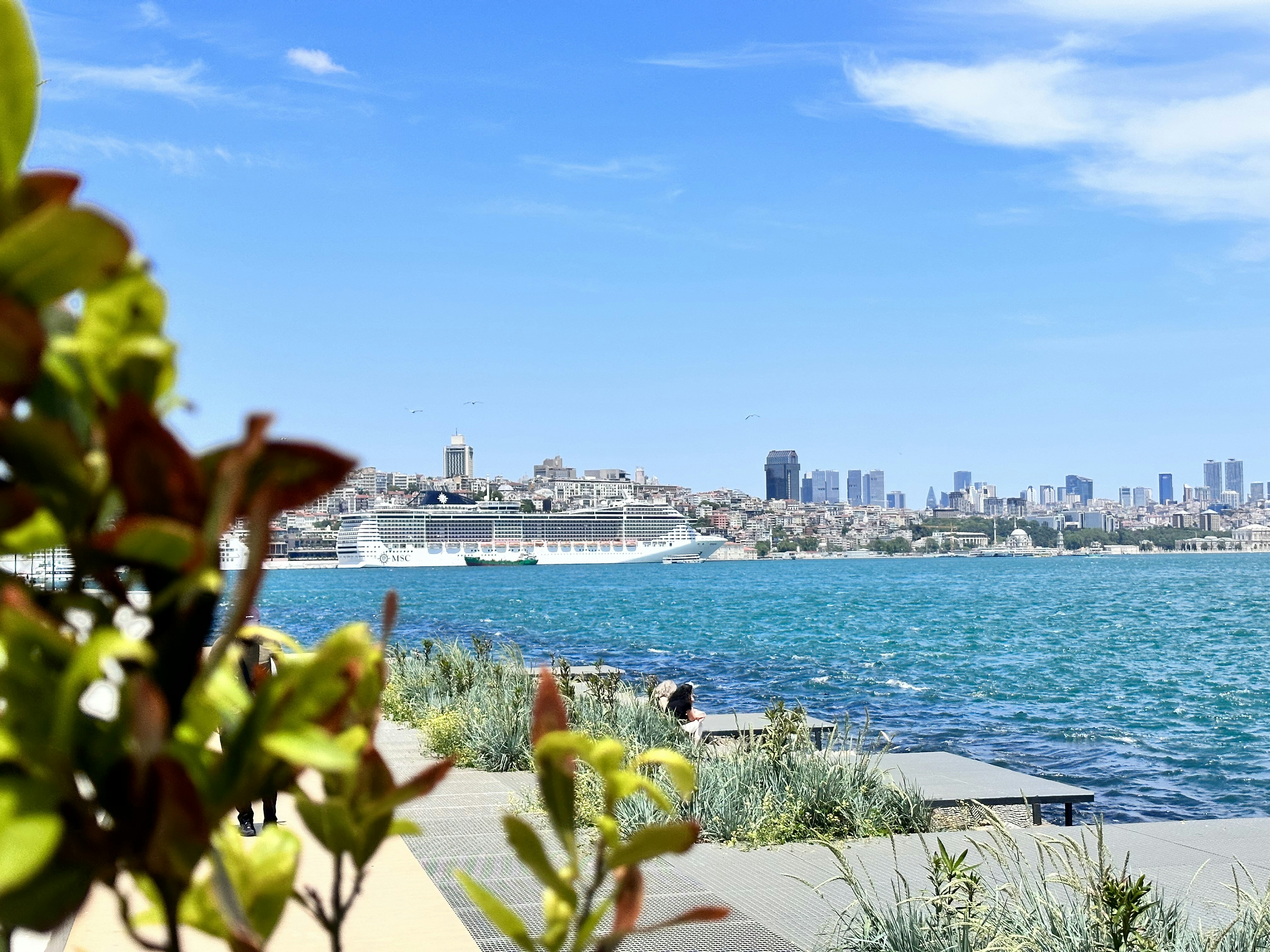 a view of a body of water with a city in the background, Istanbul is a must see