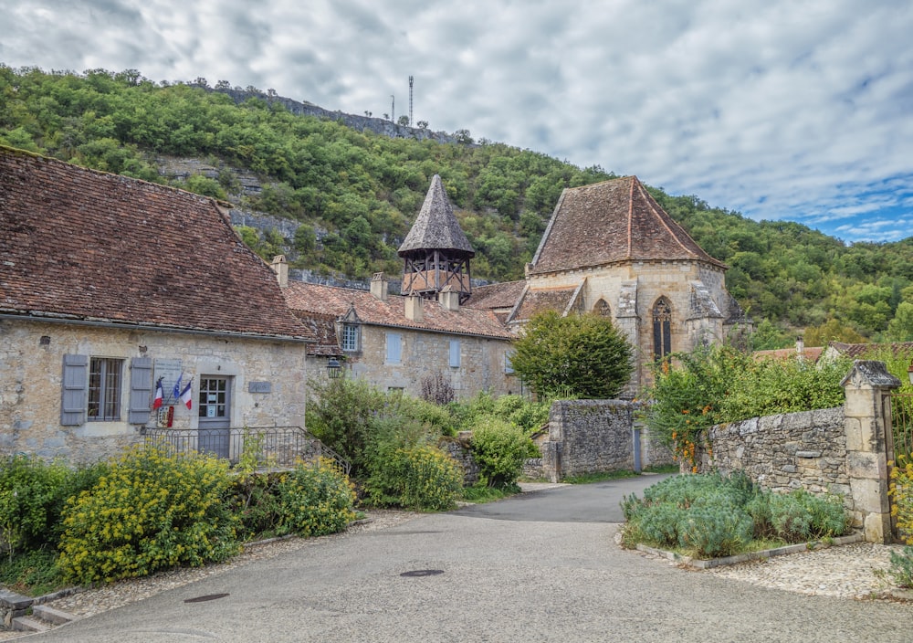 a stone building with a steeple on top of it