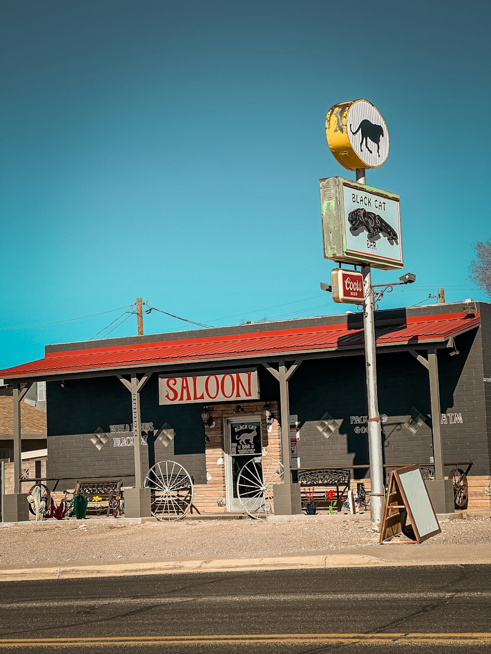 a building with a sign that says saloon on the front of it