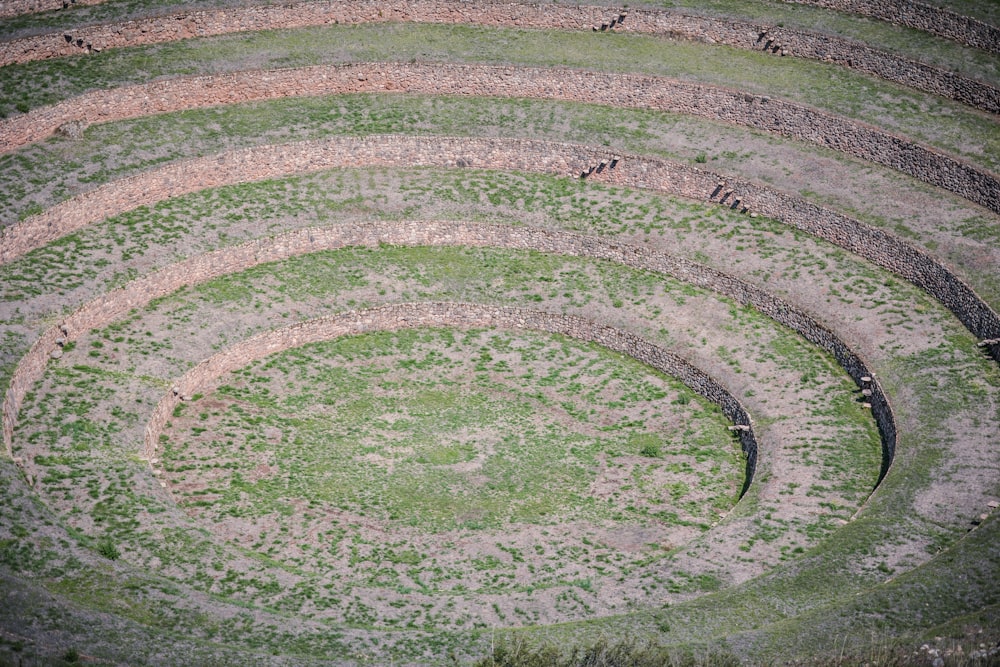 an aerial view of a circular stone structure