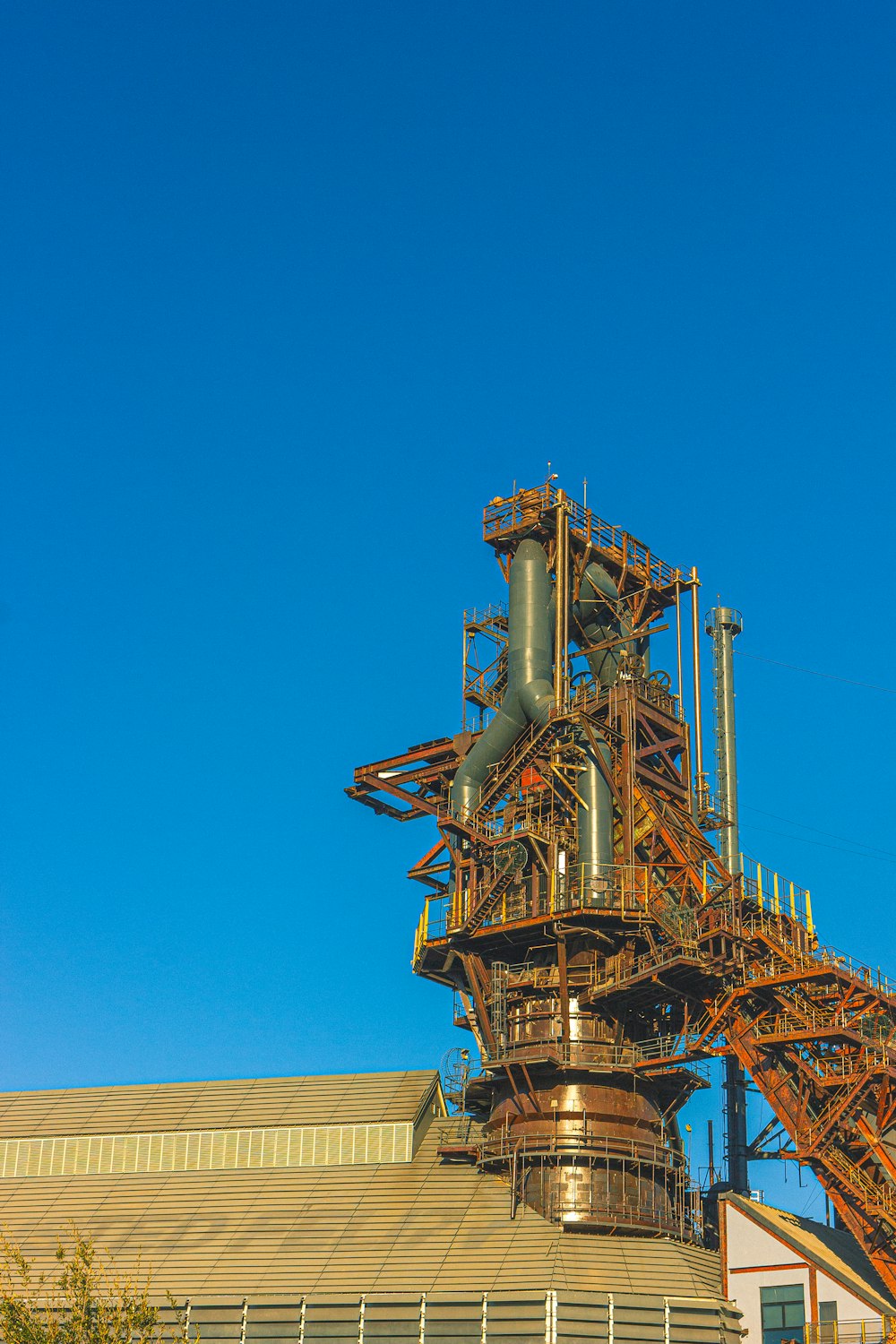 a building with a large metal structure on top of it