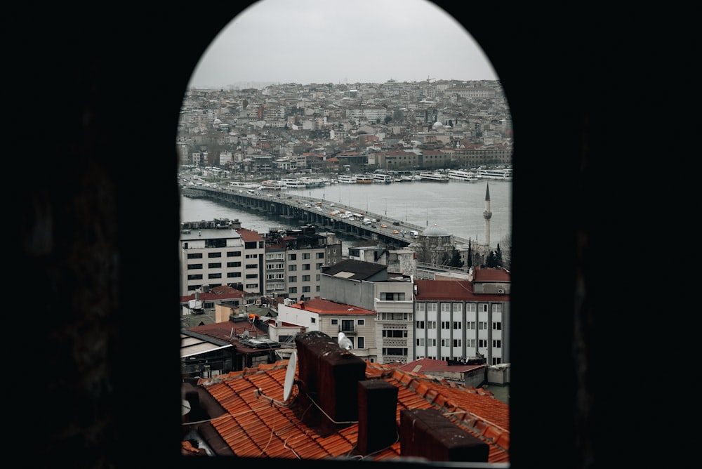 a view of a city from a window in a building