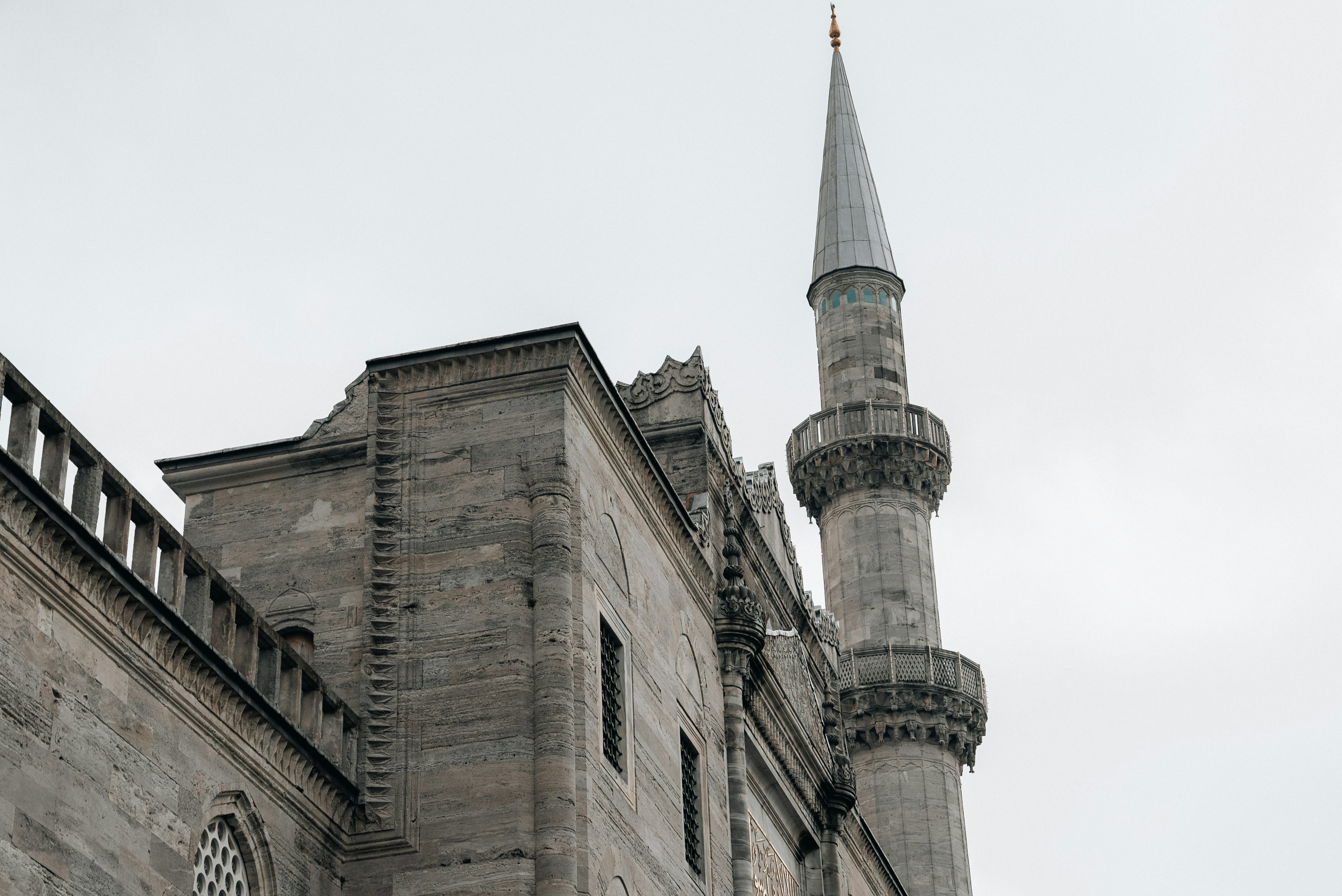 a tall building with a clock on the side of it