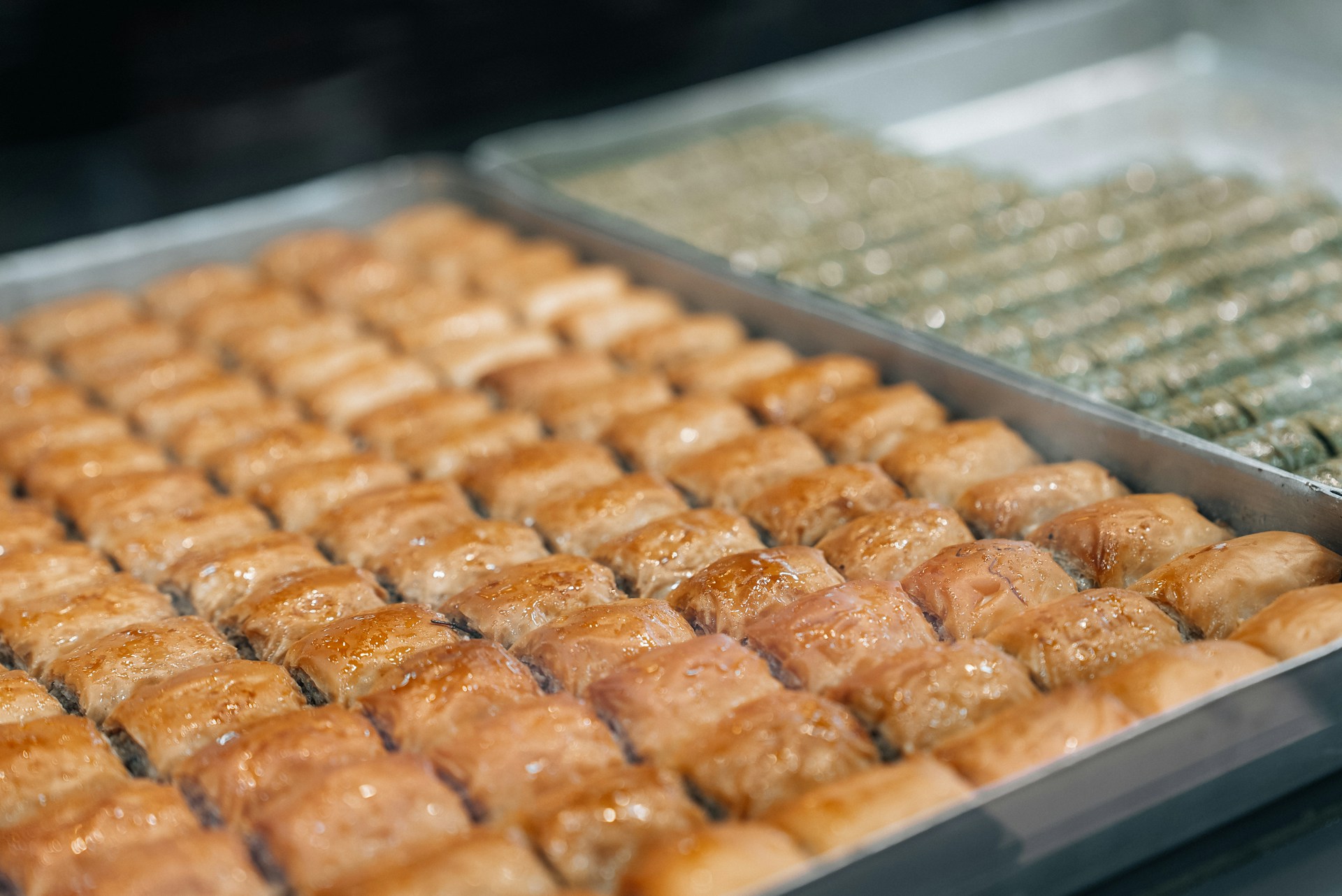 a close up of a tray of doughnuts