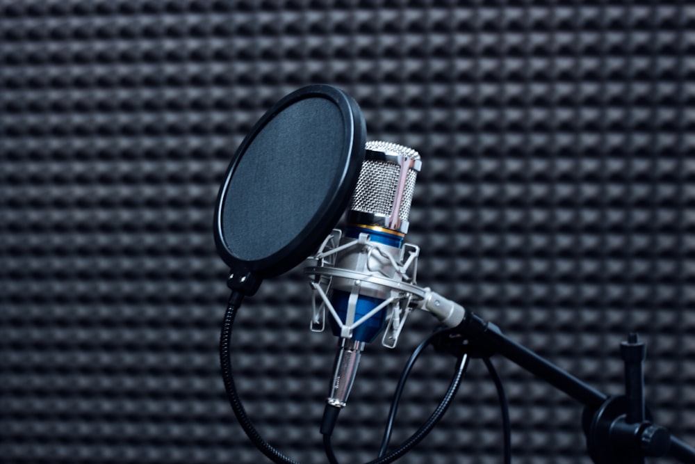 a microphone in front of a black background