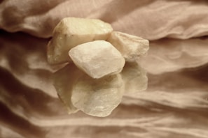 Subtle reflections of light on polished stones creating a serene and harmonious atmosphere