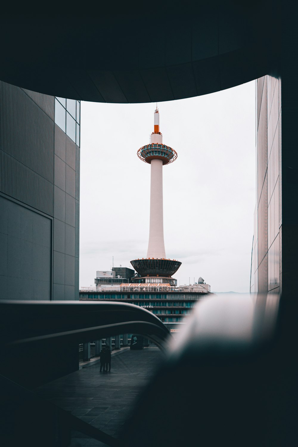 a tall tower with a clock on top of it