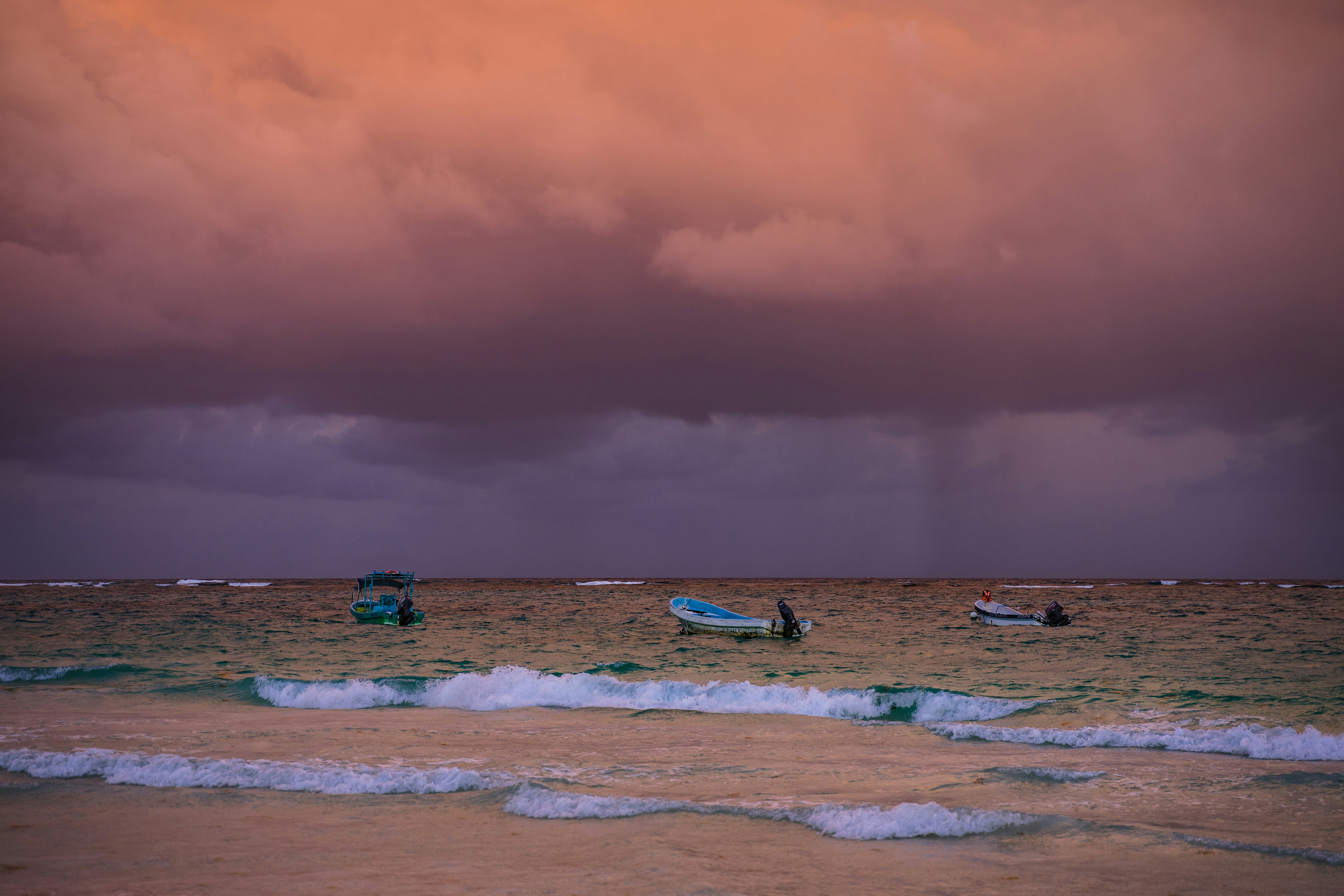 a couple of boats that are in the water