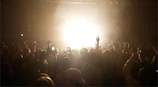 Crowd vibing to a late-night podcast recording session