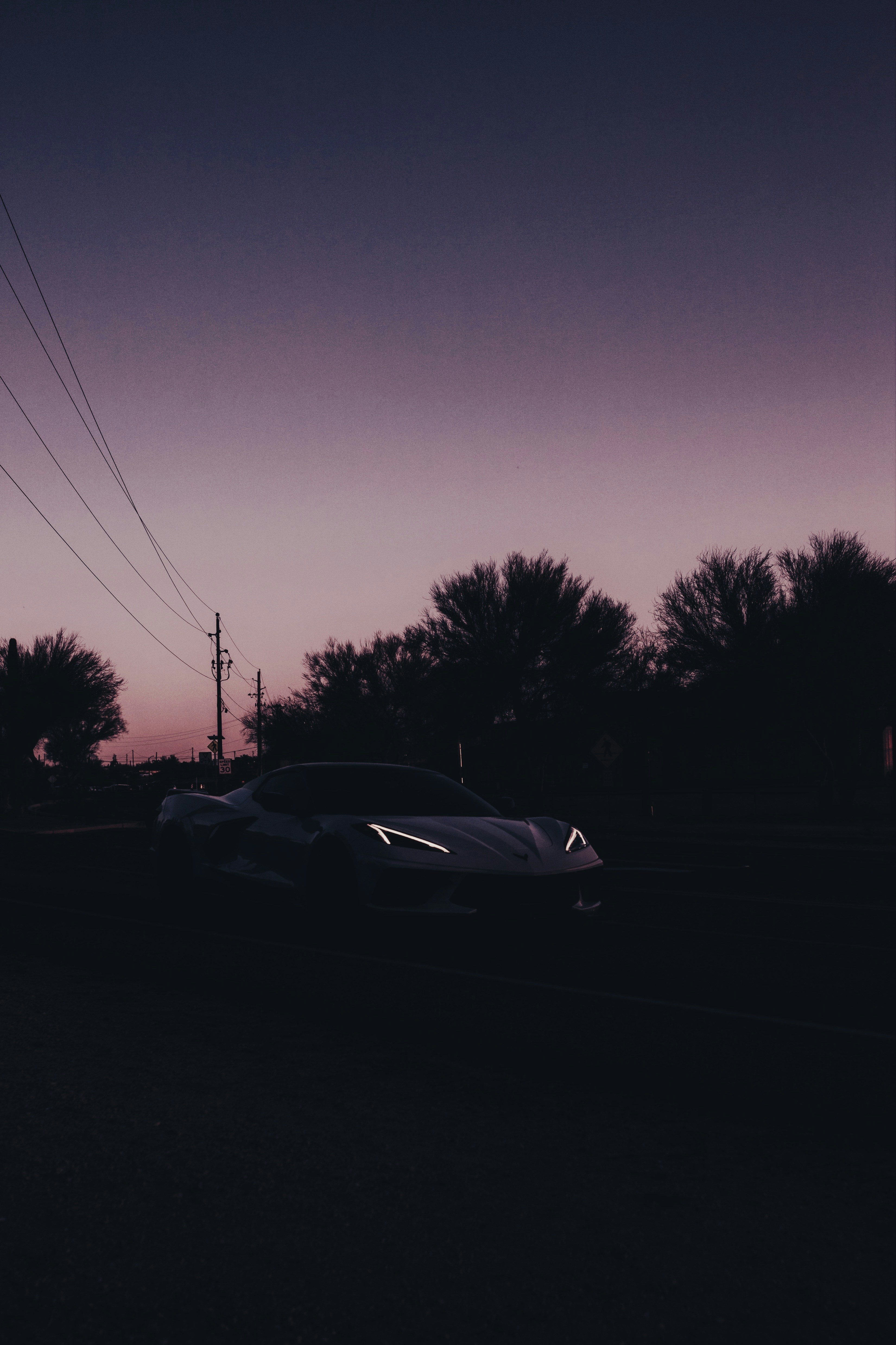 a car is parked on the side of the road