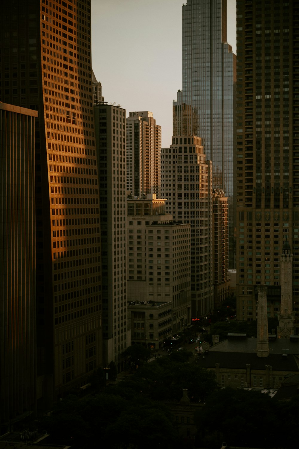 a view of a city with tall buildings