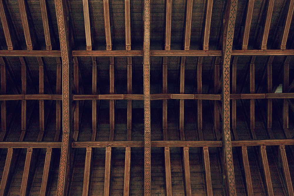 a ceiling made of wooden planks in a building