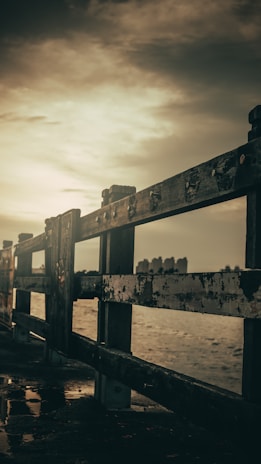 An atmospheric scene from a moody, cinematic music video set at dusk.