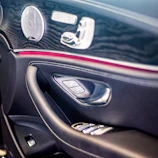 Door panel transformation showing cracked old panel replaced with new premium leather design matching car interior.