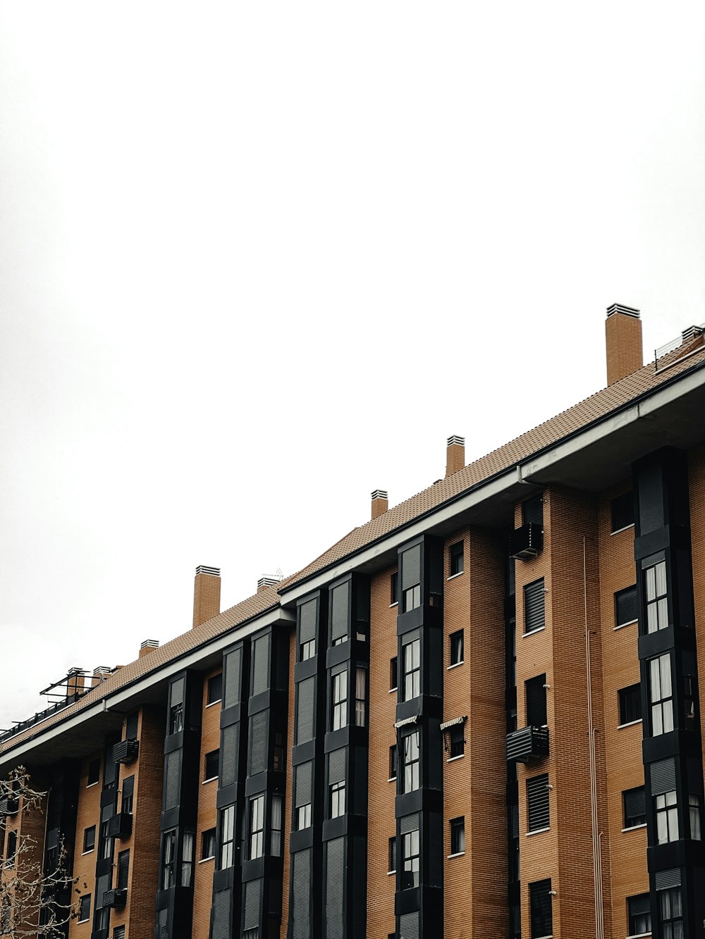 a tall building with a clock on the side of it