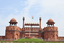 Historic red sandstone walls of Mughal Red Fort monument in Delhi