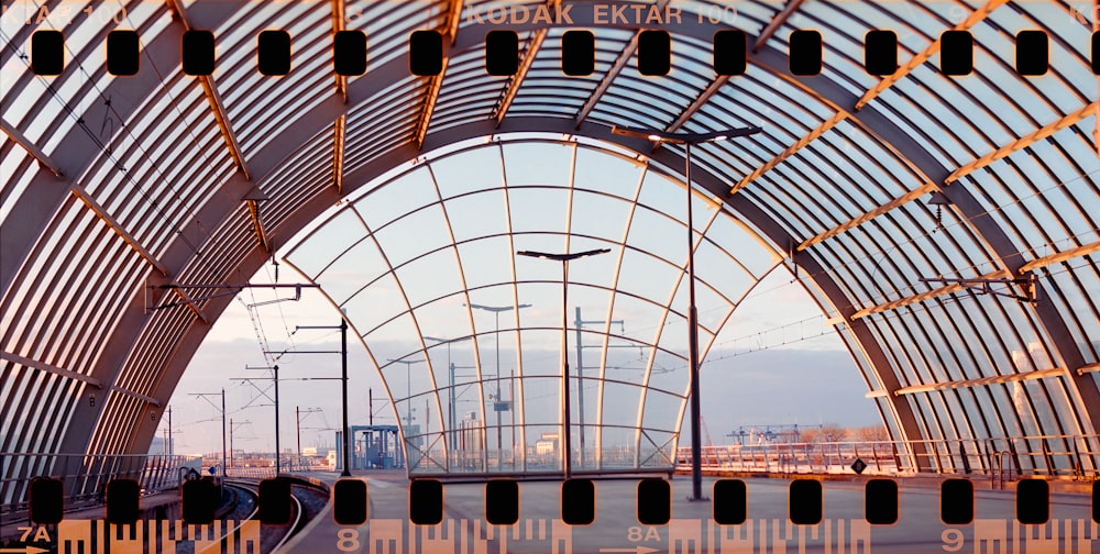 a train station with a train on the tracks