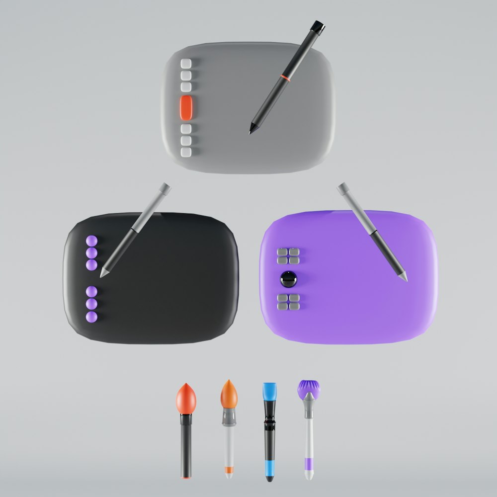 a group of different colored objects with a pen