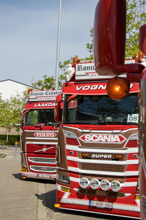 A fleet of trucks lined up outside, showcasing durability and brand trust