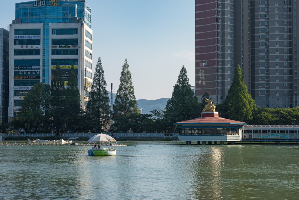 a body of water surrounded by tall buildings