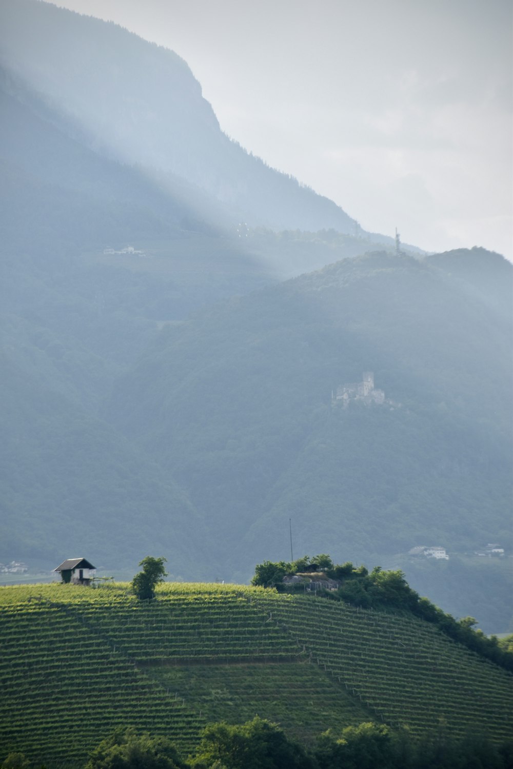 a hill with a house on top of it