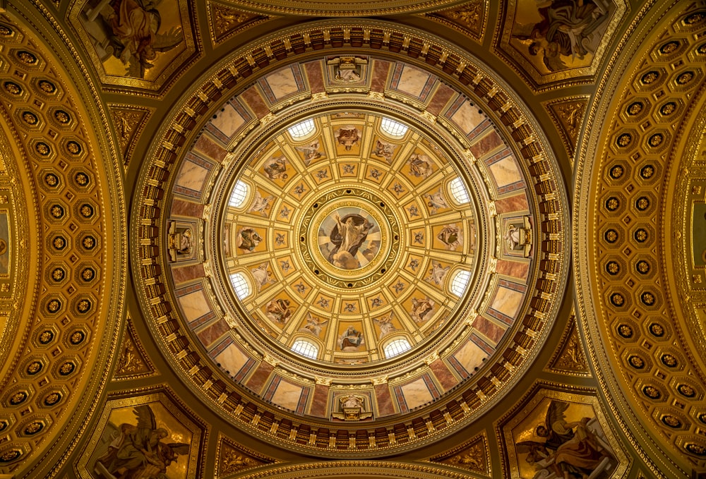 the ceiling of a large building with a dome