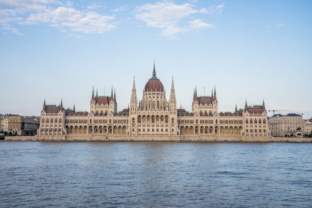 a large building sitting on top of a body of water