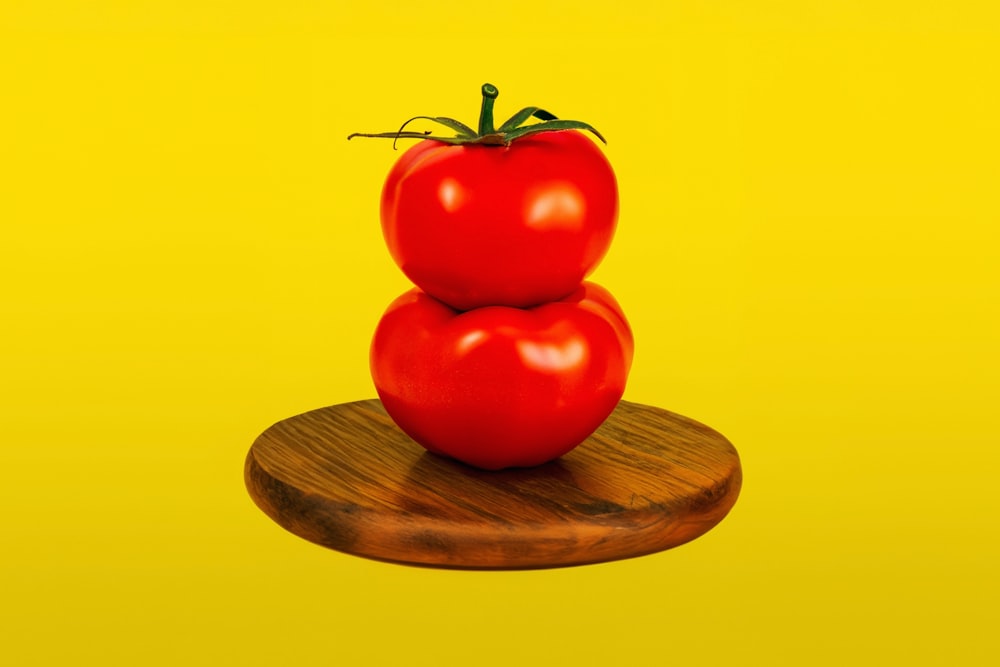 three tomatoes stacked on top of each other
