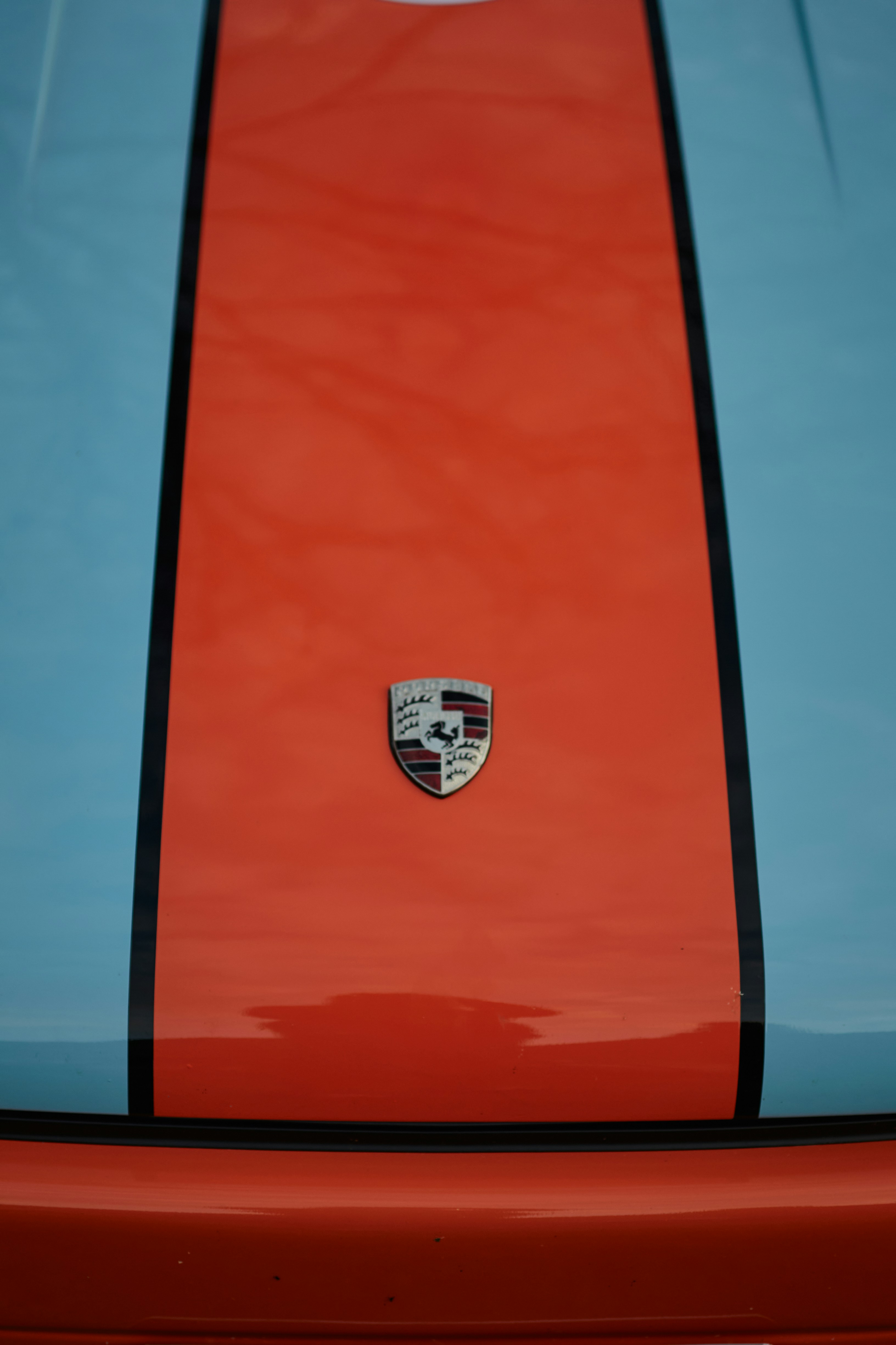 a close up of a red and blue sports car