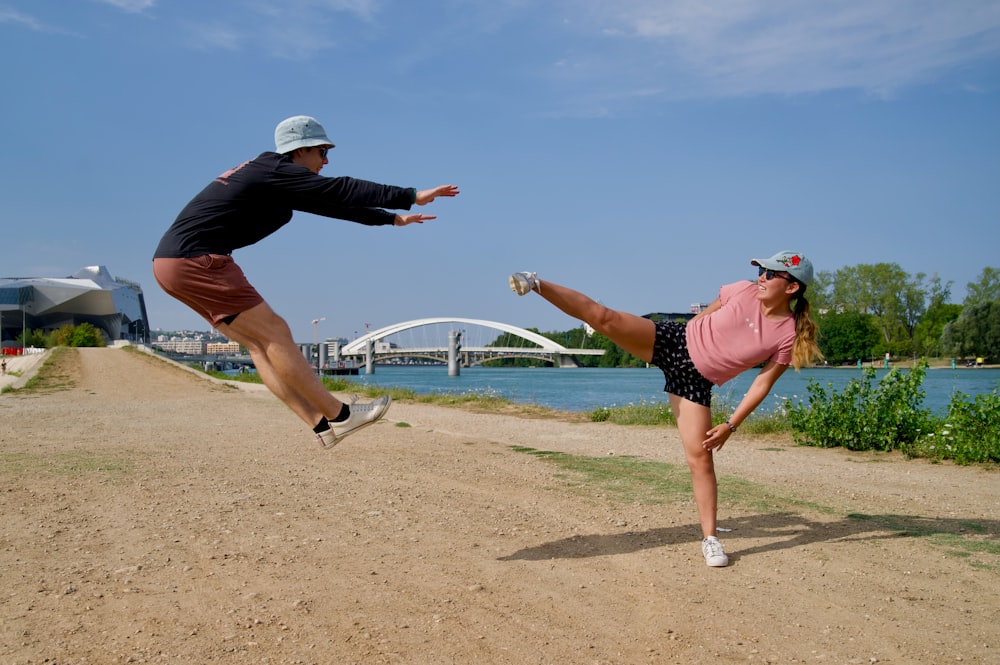 a couple of people that are jumping in the air