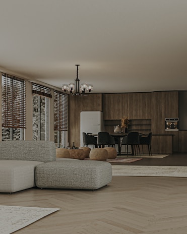 Spacious kitchen area highlighting durable vinyl flooring and sleek blackout blinds on large windows.
