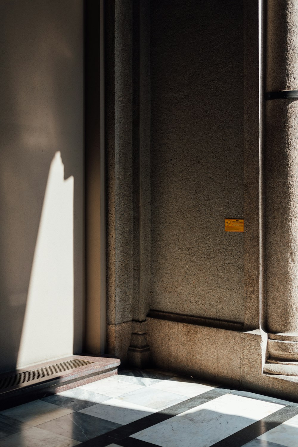 a door with a yellow sign on the side of it