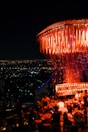 Trendy rooftop bar with panoramic city views.