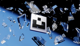 Floating geometric shapes, resembling shattered glass, are suspended around a central logo against a backdrop transitioning from black to blue. The scene conveys a sense of motion and fragmentation.