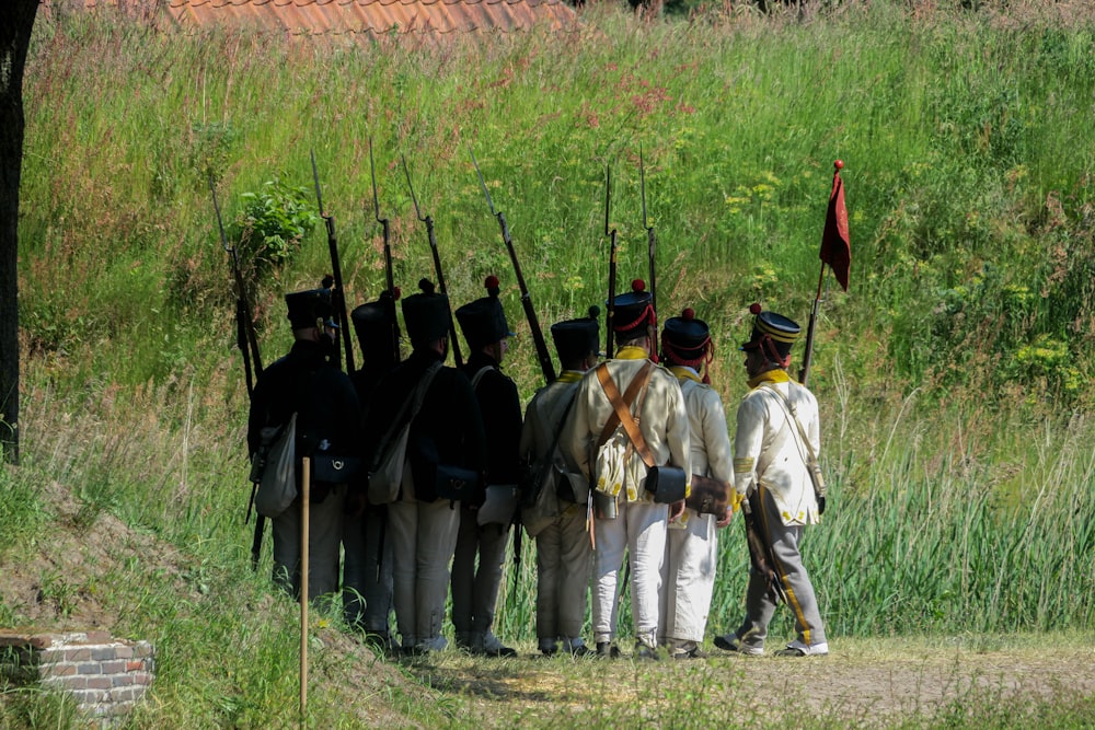 a group of men standing next to each other