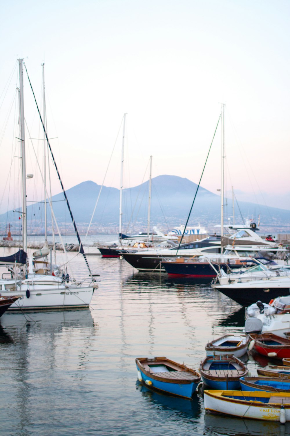 a bunch of boats that are in the water