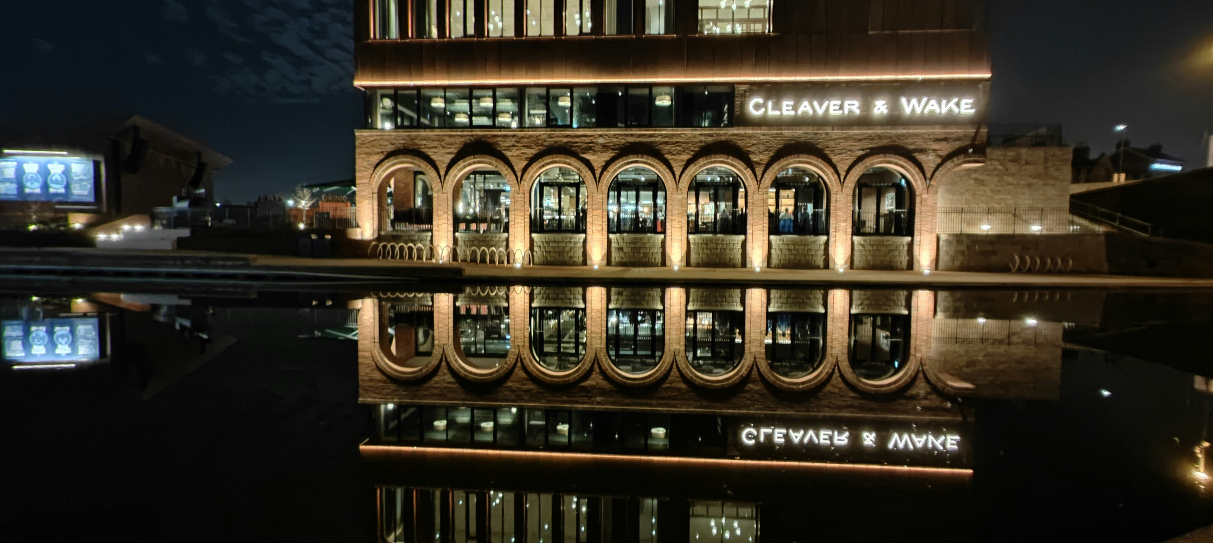 a building that is reflecting in the water