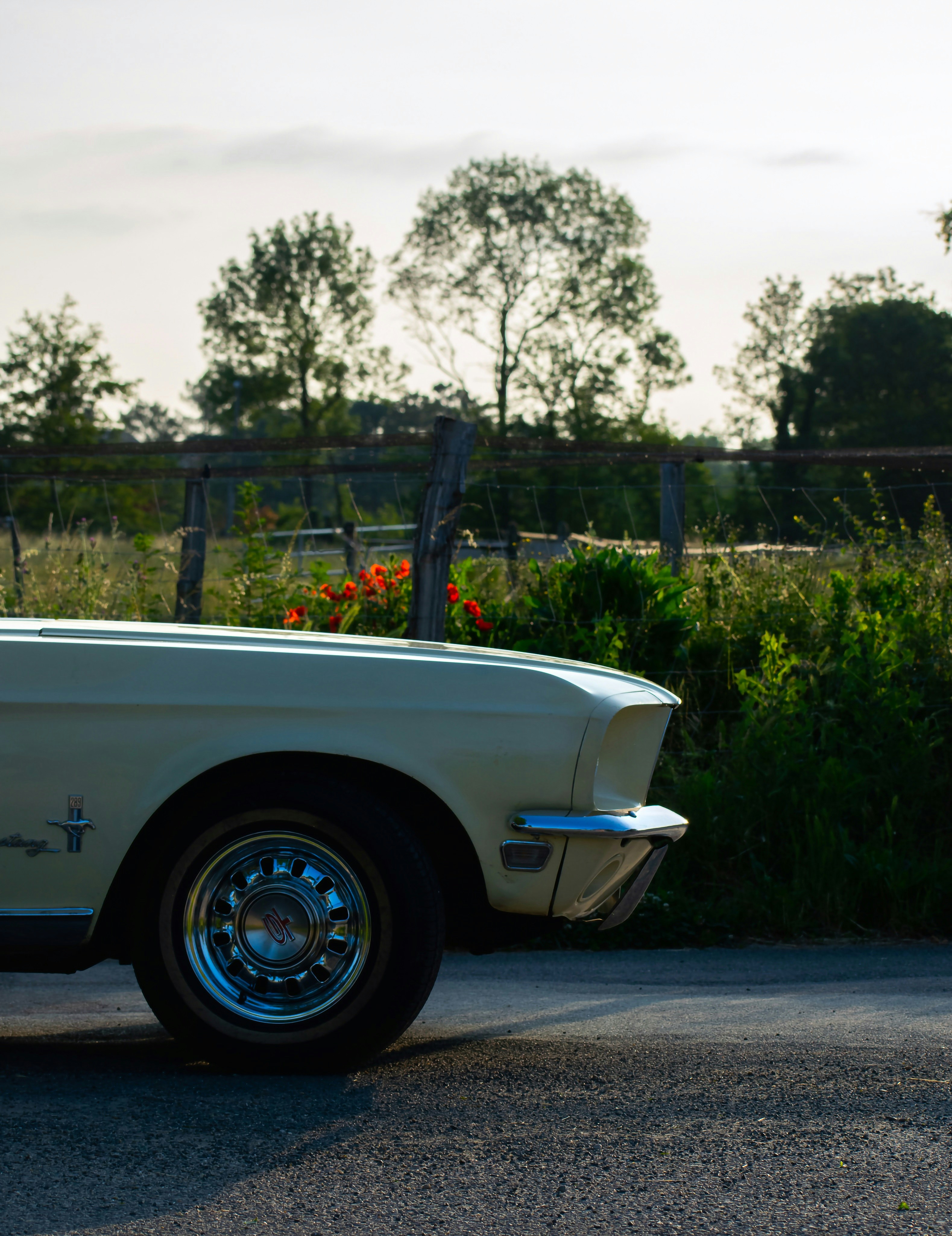 a white car parked on the side of the road