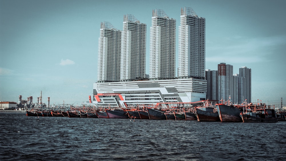 a large body of water next to tall buildings