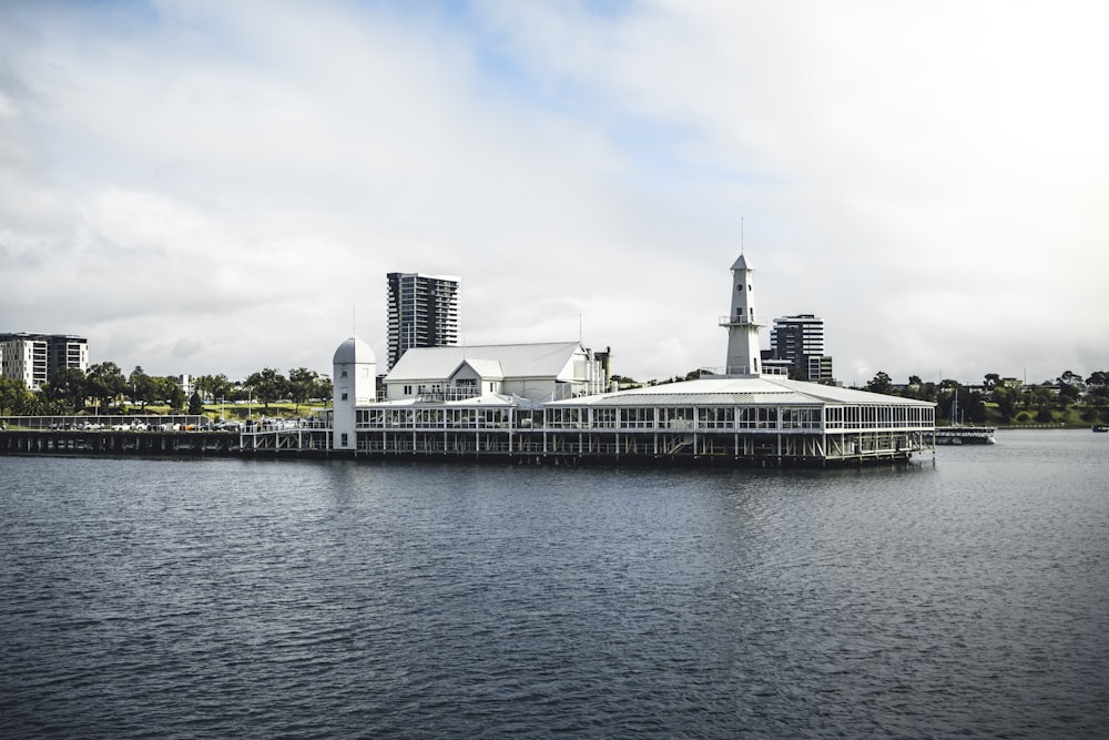 a large building sitting on top of a body of water