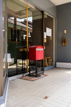 A welcoming Gorite Travel and Shipping storefront with travel posters and shipping boxes visible.