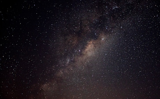 A stunning view of the night sky filled with stars over the observatory.