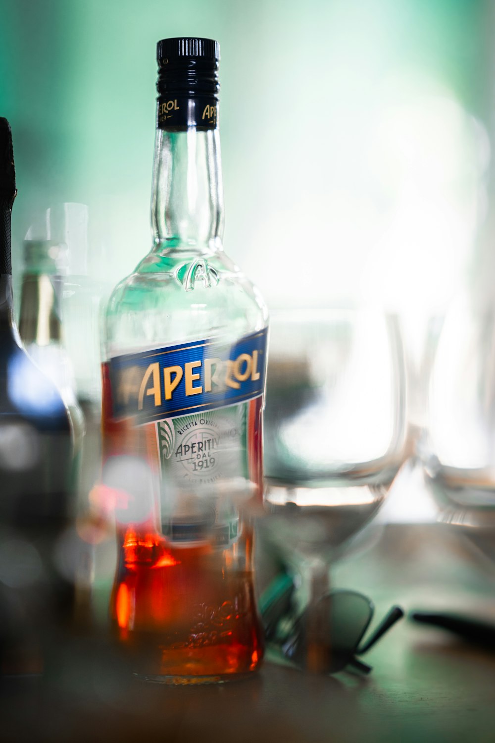 a bottle of aperol sitting on a table