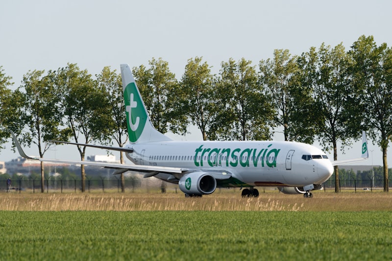 A large passenger jet sitting on top of an airport runway