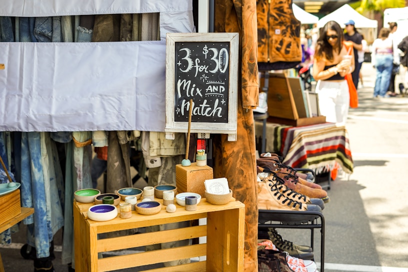 a sign that is on a wooden stand