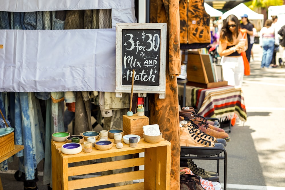 a sign that is on a wooden stand