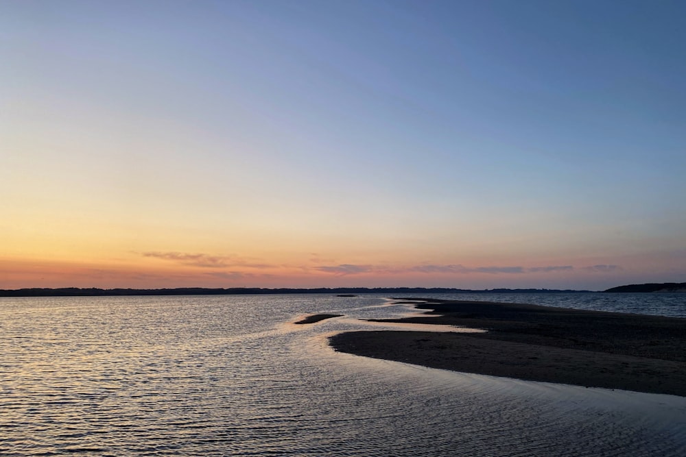 a body of water that is next to a beach